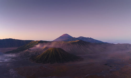 View of volcanic mountain during sunset