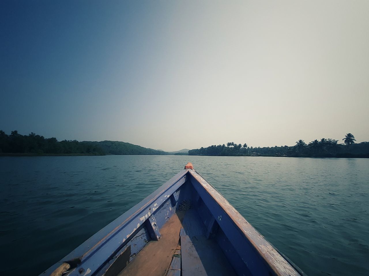 VIEW OF LAKE AGAINST CLEAR SKY