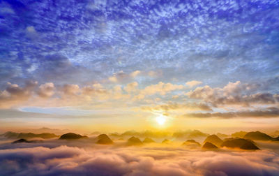 Scenic view of dramatic sky during sunset