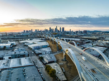 Aerial panoramic view of industrial urban borough and modern road bridge. skyline with downtown