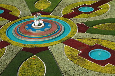 High angle view of multi colored water on grass