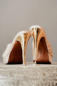 Close-up of shoes on table