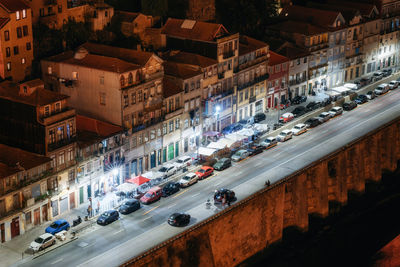 High angle view of traffic on road amidst buildings