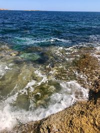 Scenic view of sea against clear sky