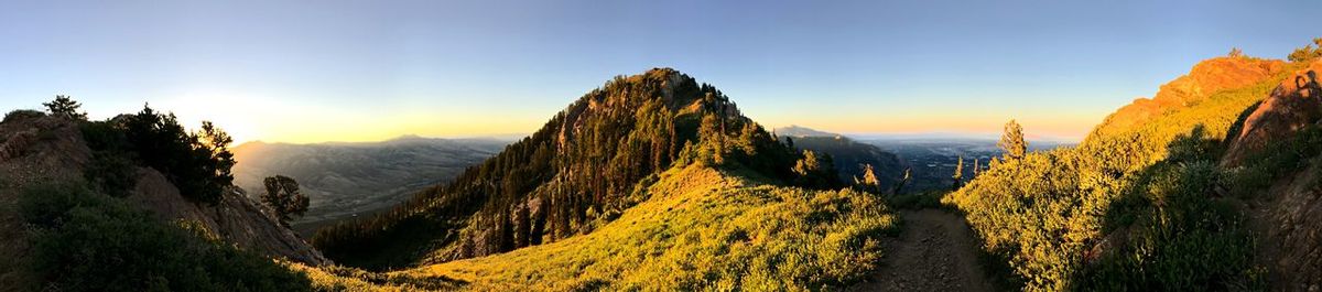 Panoramic view of mountains against sky during sunset
