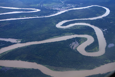 High angle view of road amidst agricultural landscape