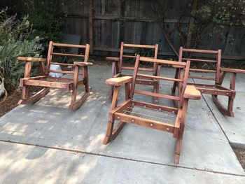 Empty chairs and tables in park