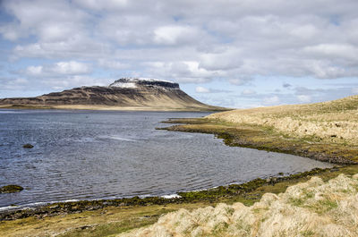 Landscape on the northcoast of snaefellsnes peninsula, with beaches, grassy hills and a mountain