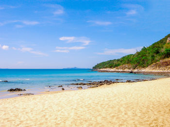 Scenic view of beach against sky