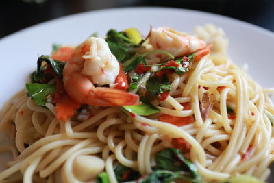 Close-up of noodles served in plate