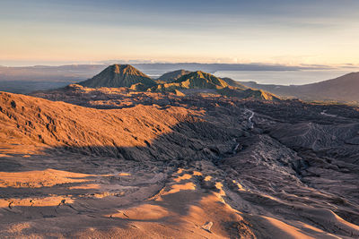 Scenic view of mountain range against sky during sunset