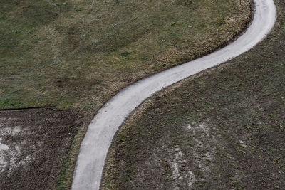 High angle view of empty road amidst landscape