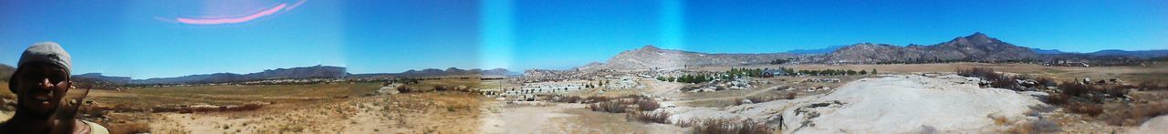 Panoramic view of landscape against clear sky