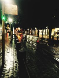 Illuminated street light at night