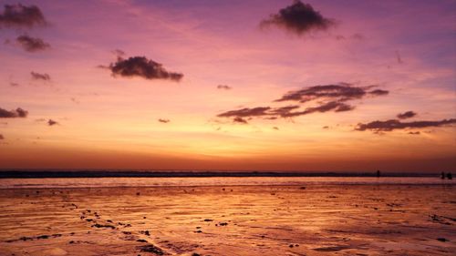 Scenic view of sea against sky at sunset