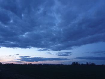 Scenic view of dramatic sky during sunset