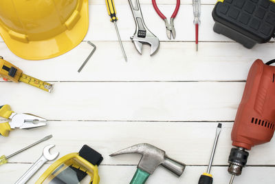 Close-up of work tools on table