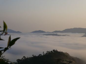 Scenic view of mountains against sky at sunset