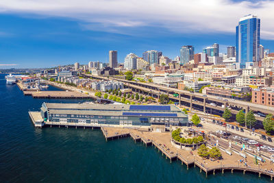 High angle view of river amidst buildings against sky