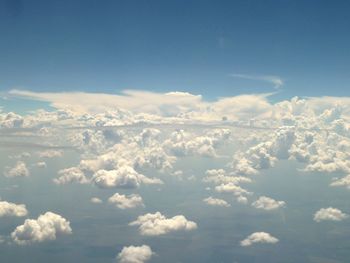 Aerial view of clouds over mountain