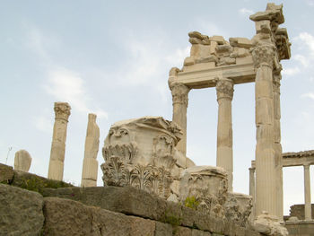 Low angle view of old ruins against sky