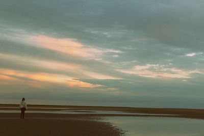 Scenic view of sea at sunset