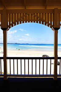 Scenic view of kirra beach seen through arch