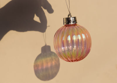 Close-up of christmas ball against white background