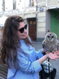 Young woman wearing sunglasses