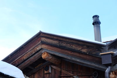 Low angle view of built structure against clear blue sky