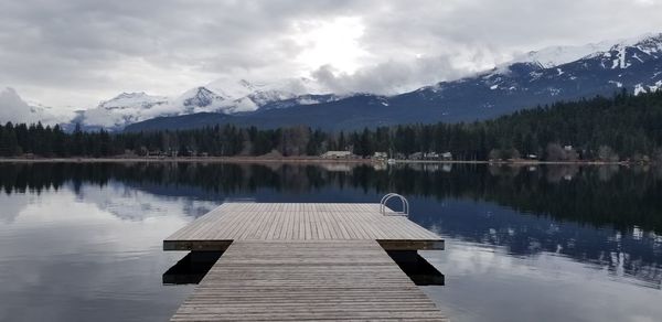 Mountain view from the dock at rainbow park, alta lake, whistler.