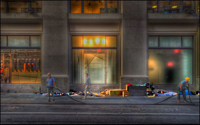 View of city street in front of building