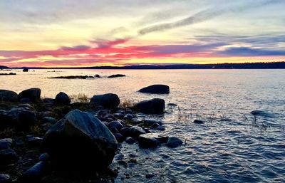 Scenic view of sea against sky during sunset