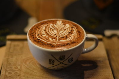 Close-up of cappuccino on table