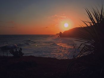 Scenic view of sea against sky during sunset