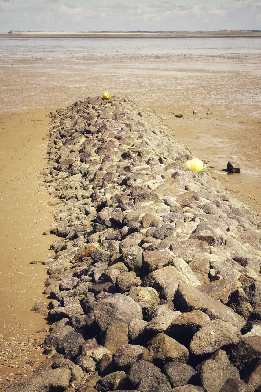 PEBBLES ON SHORE