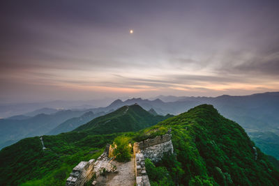 Panoramic view of mountains against sky during sunset