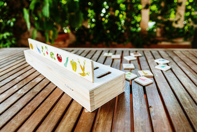 High angle view of text on wooden table