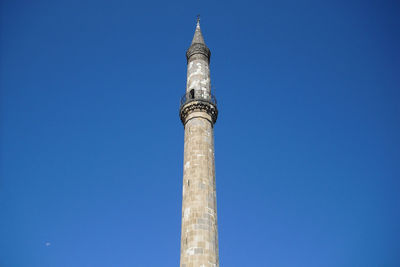 Low angle view of building against blue sky