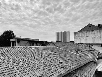 High angle view of residential buildings against sky