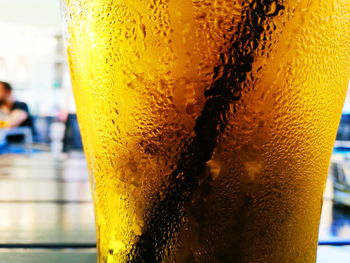 Close-up of beer glass