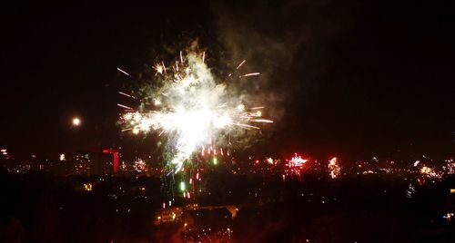 Firework display at night