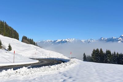 Snow covered mountain against sky