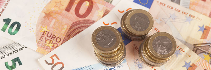 Close-up of coins on table