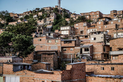 Buildings in city against sky