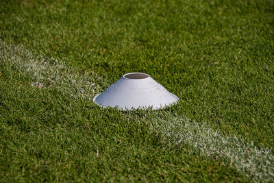 High angle view of umbrella on field