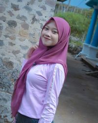 Portrait of a smiling young woman