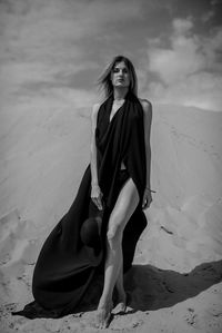 Full length of a young woman on beach