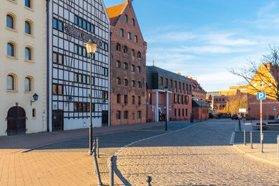 People walking on street in city