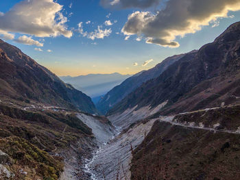 Scenic view of mountains against sky during sunset